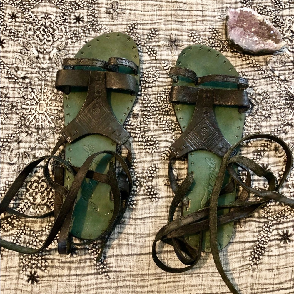 Free People leather wrap around sandals.